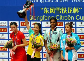Up and coming: Women's singles champion Intanon Ratchanok of Thailand lifts up her Dongfeng Citroen Cup. On the podium with her is China's Li Xuerui (far left) and third place finishers India's P.V. Sindhu (second from right) and Korea's Bae Yeon Ju (right).